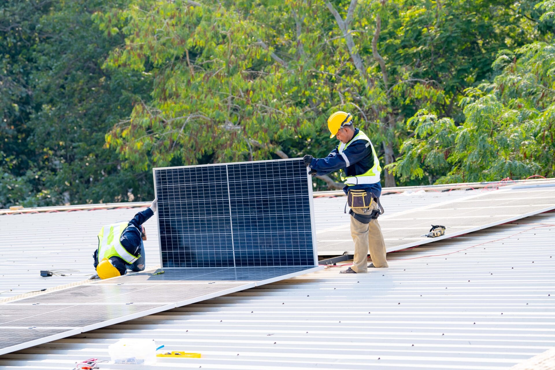 workers-installing-solar-panels